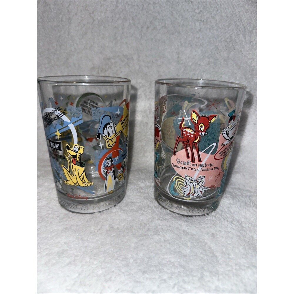 2 McDonald’s Walt Disney World 100 Years of Magic 2001 Collector Glasses